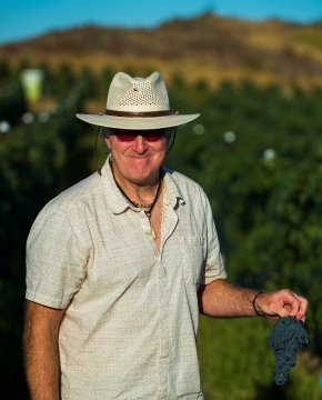 Phil Cline in a vineyard